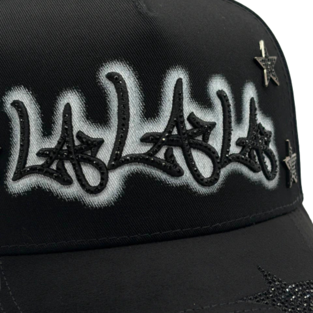 Gorra Rico Hats LALALA Black Drop 2026 — Trucker negra con pedrería